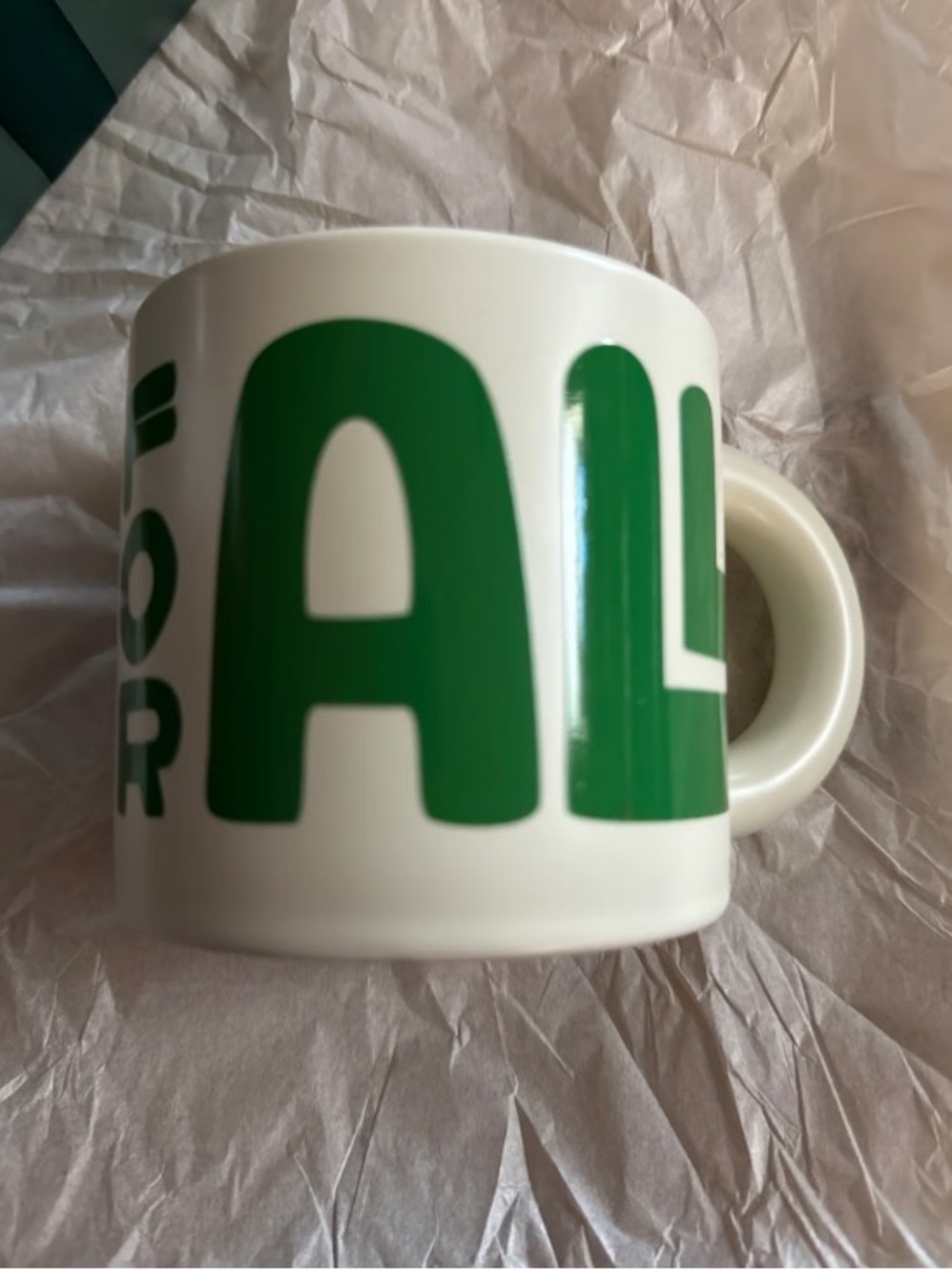 White Ceramic Mug with Bold Green Lettering
